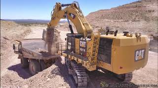 CAT 6015B Excavator Loading 100 Ton Haul Trucks [upl. by Kermy]